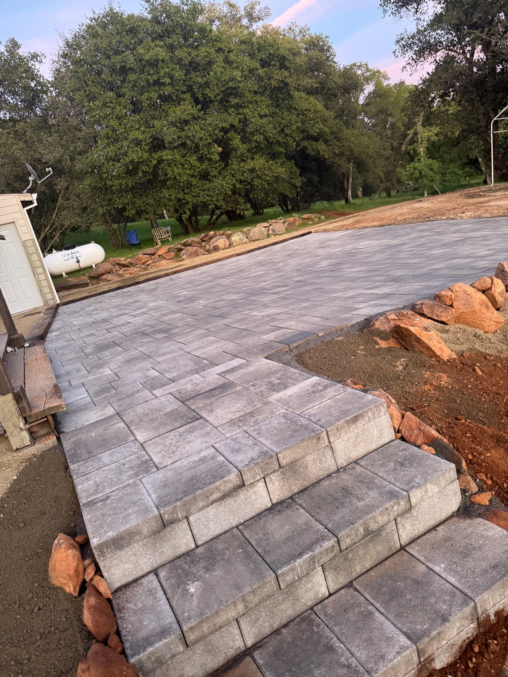An immaculate  brick patio installed in Grass Valley CA by Agua Fria Landscape