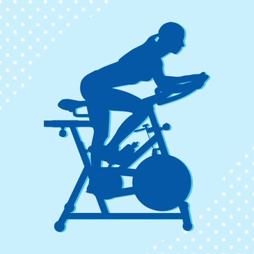 A silhouette of someone riding a stationary spin cycle and exercising intensely.