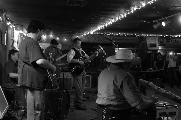 Brent onstage with his full band of brothers