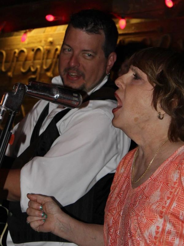 Brent and his mom sharing the stage together
