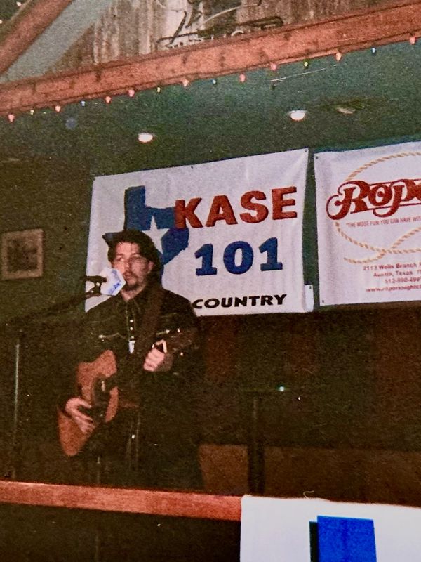 Brent playing to the crowd while auditioning for Nashville Star