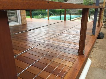 spotted gum deck with stainless wire balustrade.
