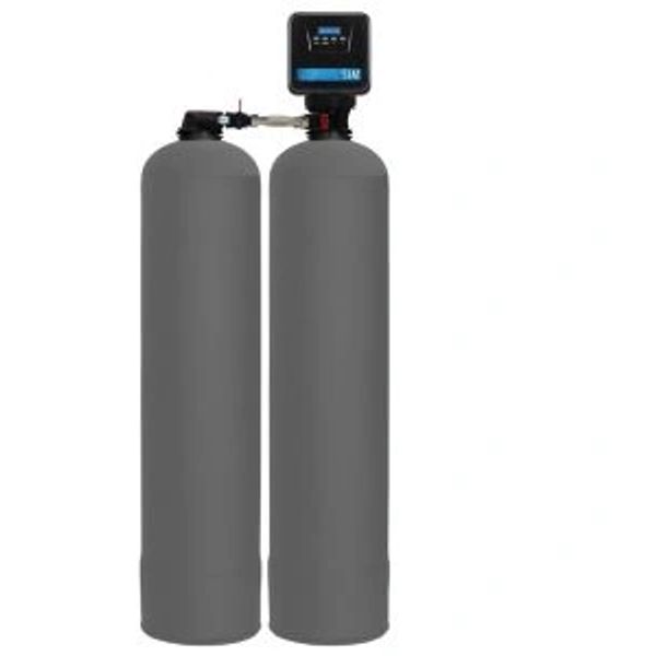 A dual-tank water softener system with a control panel on top.