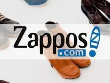 Zappos logo over shoes.