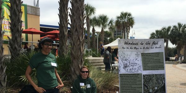 USF grad students with interpretive signs developed for a public archaeology day in downtown Tampa.