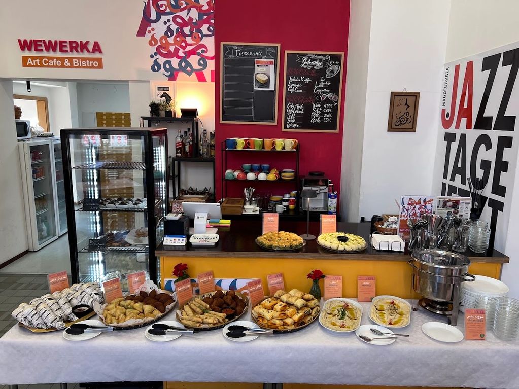 Buffet spread with Middle Eastern dishes at WEWERKA Art Cafe &amp; Bistro.