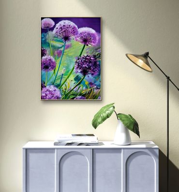 Vibrant purple flowers artwork hanging above a modern sideboard with a plant and floor lamp nearby.