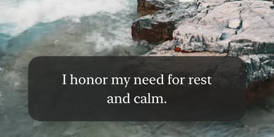 A serene river flows by rocky shores at sunset, embodying calm and rest.