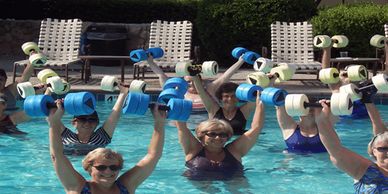 Water Weights being held over head.