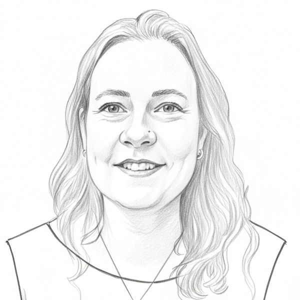 Pencil sketch portrait of a smiling woman with wavy hair.
