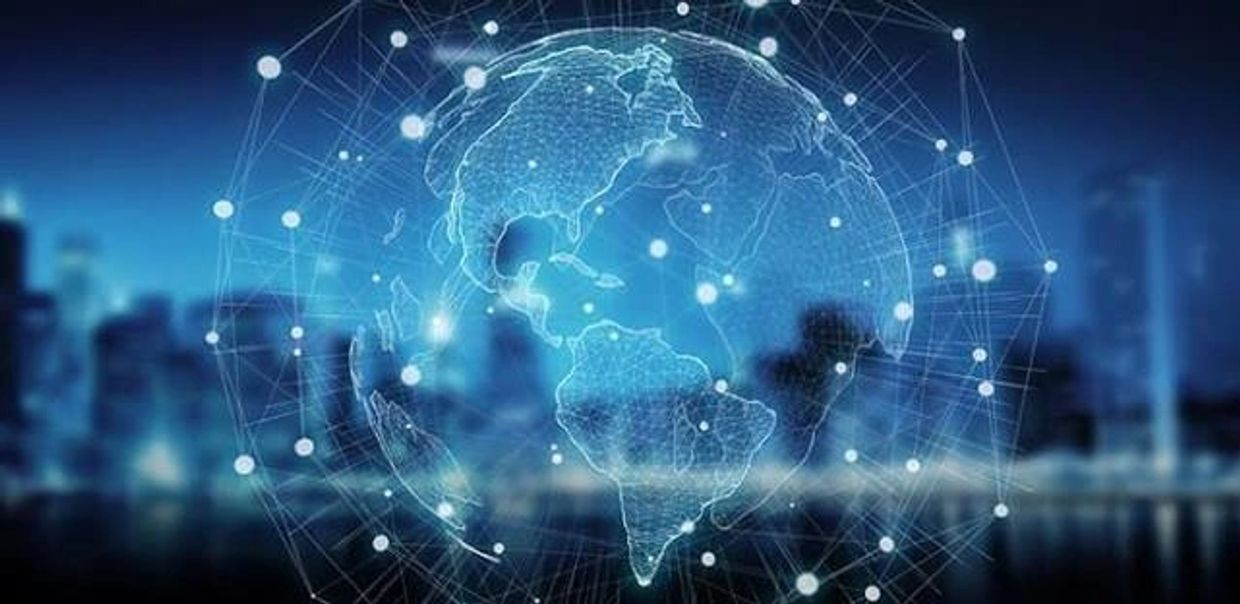 Digital globe with network connections over cityscape background.