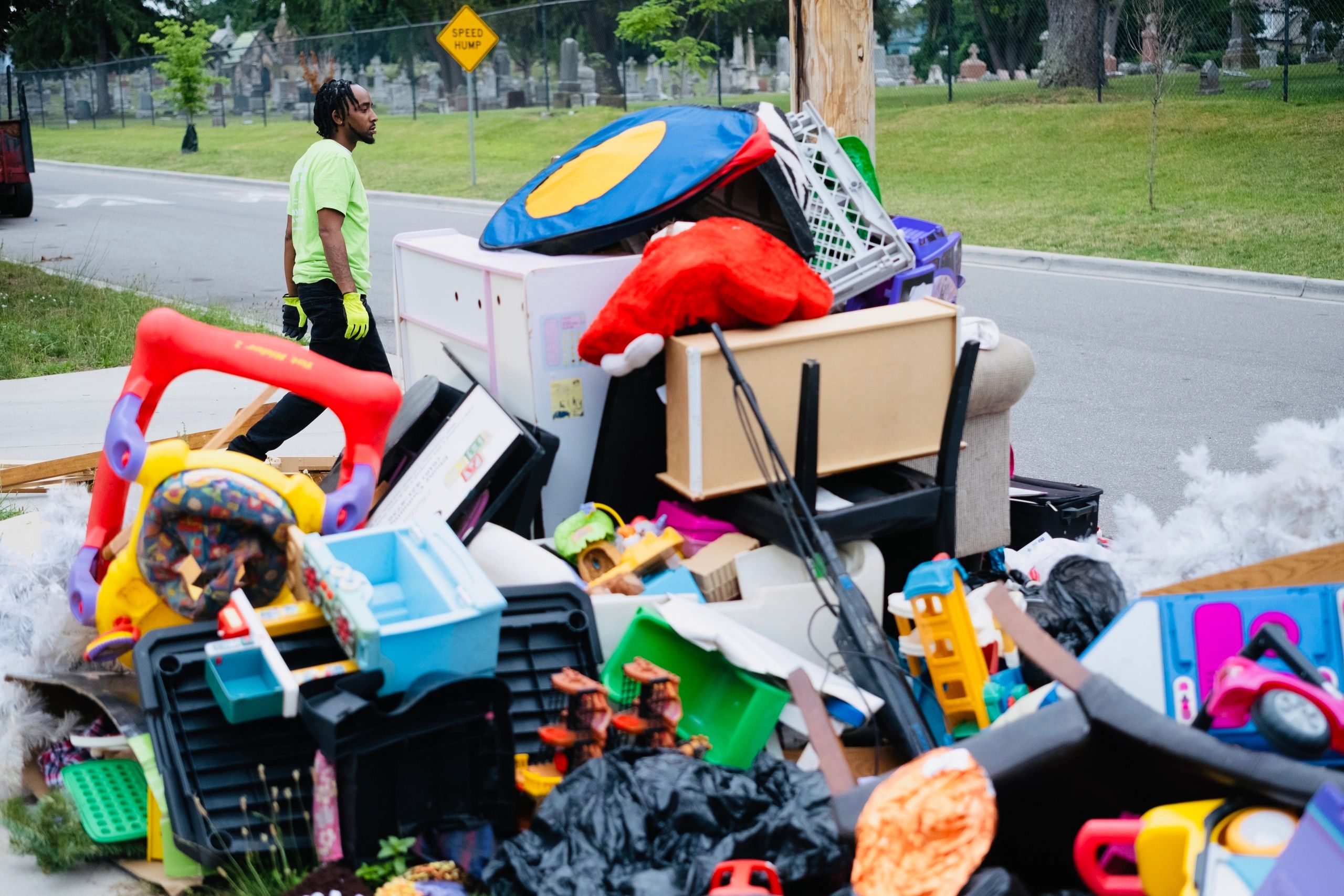 Large curbside pile of furniture, household items and junk ready for removal by RTS Rocks Trash Serv