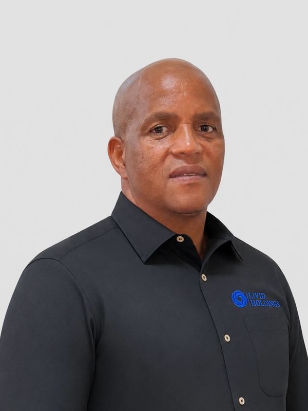 Professional man wearing a black shirt with a company logo.