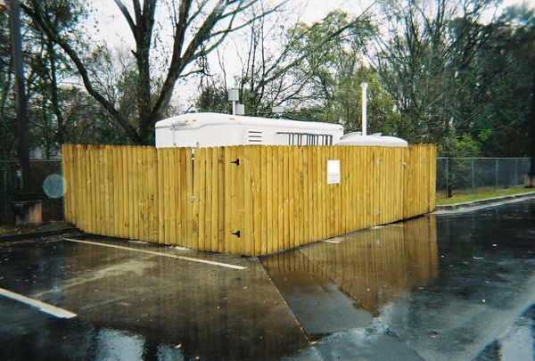 Aboveground equipment within fenced area at completion of construction.