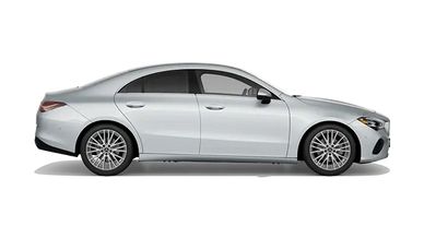 Silver luxury sedan with sleek design and tinted windows.