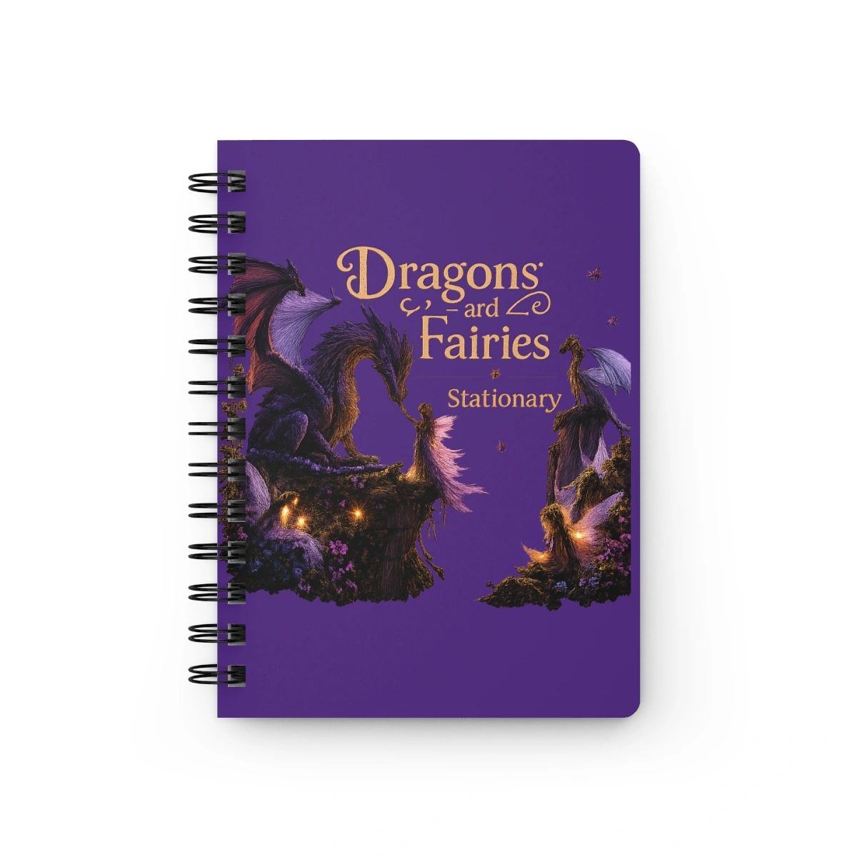 Purple notebook with dragons and fairies illustration on the cover.