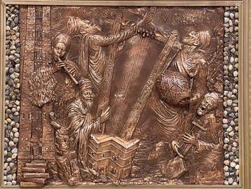 Bronze relief artwork depicting musicians playing traditional instruments.