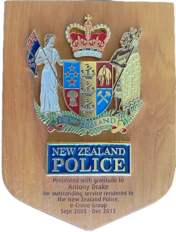 Plaque honoring Antony Drake for service in New Zealand Police e-Crime Group.