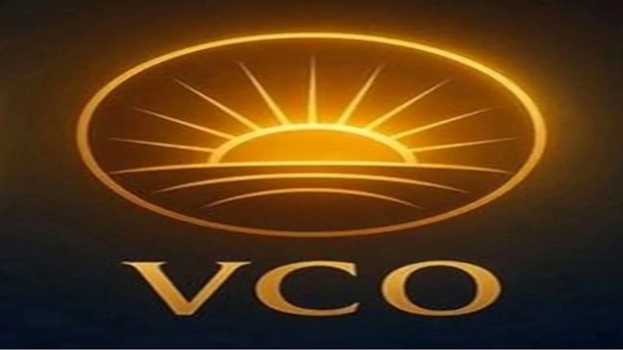 Golden sunrise logo with 'VCO' text below on a dark background.