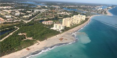 Aerial photo of beach nourishment construction at Jupiter-Carlin, FL in Dec 2019 