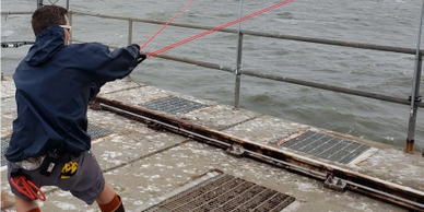 Launch of a microSWIFT buoy from the FRF pier (Duck, NC); October 2019.