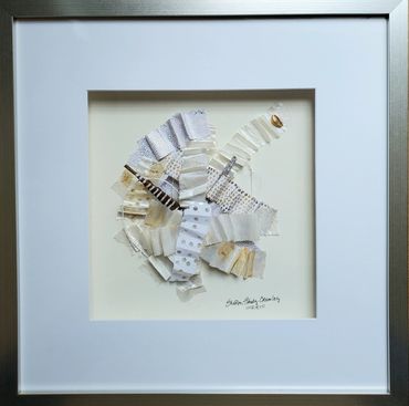 Woven collage, Delicate 3, in a shadowbox frame,  22x22, $650..