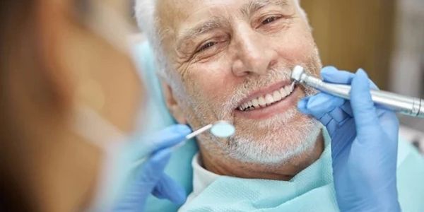 pensioner polish dentist denture false teeth clean cosmetic dentistry Invisalign NHS safe clean best