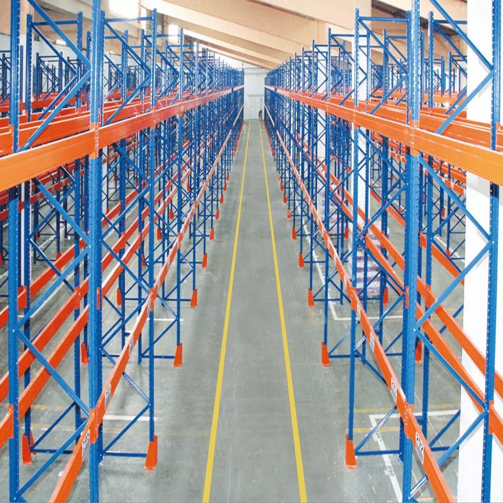 heavy-duty blue and orange industrial steel pallet racking system in large warehouse.