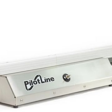 PilotLine linear motion device with adjustable clamps and a toggle switch.