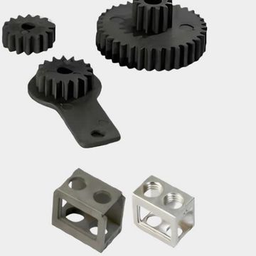 Various industrial metal and plastic mechanical parts arranged on a white background.