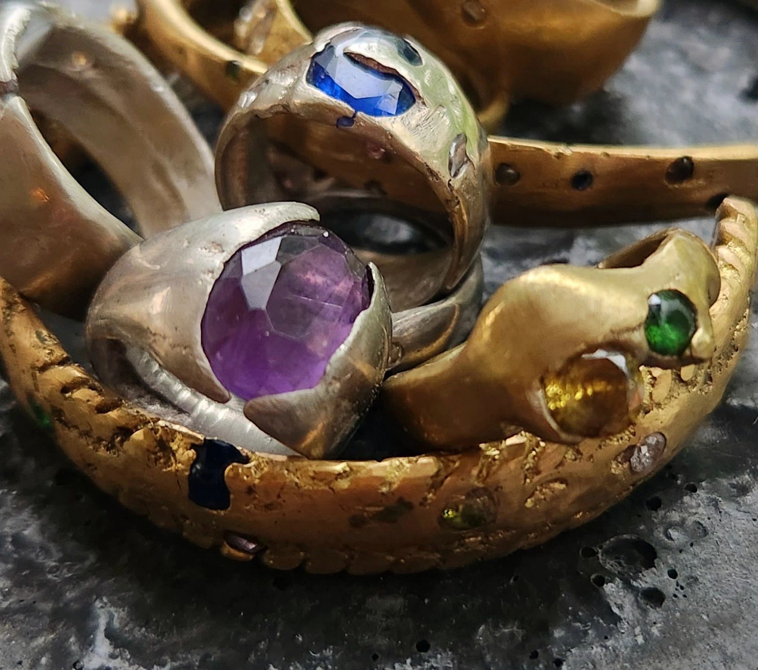 Sand casted rungs and bracelets with gemstones in place.