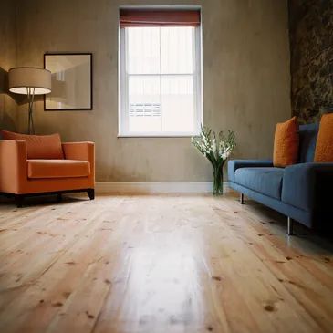 New hardwood flooring shines with a warm and inviting glow, adding natural beauty and durability 