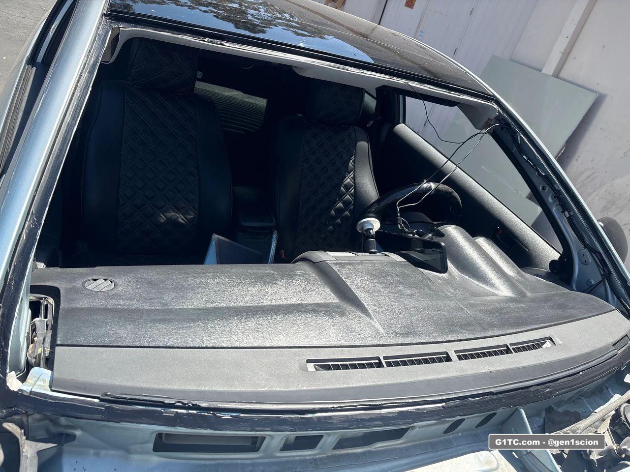 Full view of the rust inhibitor layer before laying down the windshield