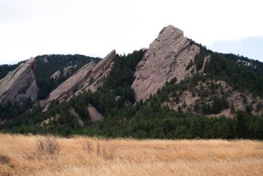 Rock formations in a mountainous forest area.