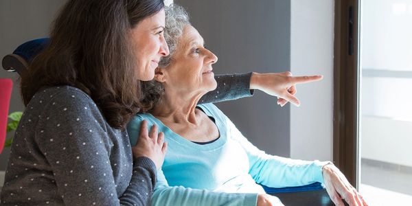 Caregiver smiling with client