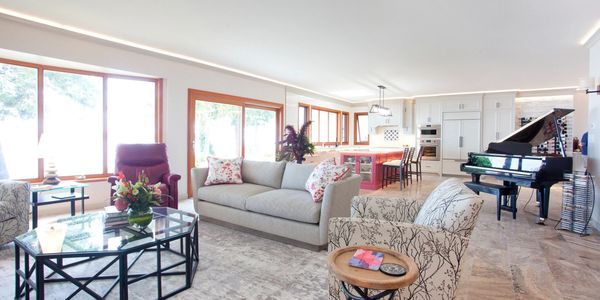 Living Room and kitchen with custom cabinetry, custom furniture & project management 