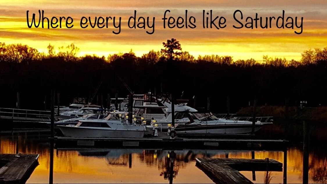 LED lighted Floating docks and boats at sunset