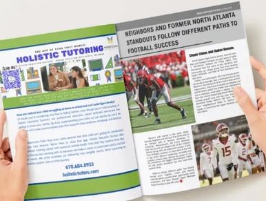 A person reads a magazine featuring holistic tutoring and North Atlanta football stories.