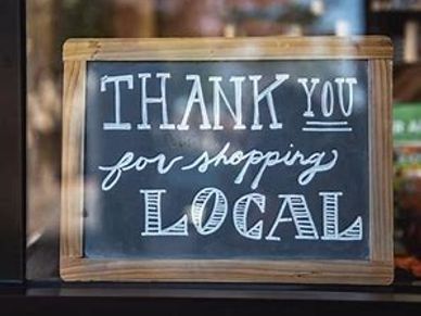 Thank you for shopping local sign.
