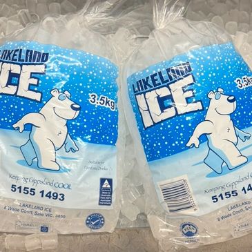 Two bags of Lakeland Ice, each weighing 3.5 kg, sitting on ice.