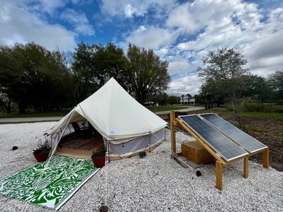 solar powered glampsite (campsite) bell tent with screens on bottom half