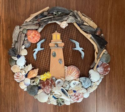 Lighthouse  Wreath made with Seashell‘s Driftwood & gemstones 
$45 plus shipping