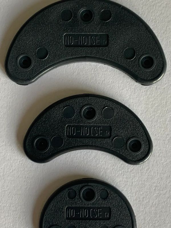 Three black curved noise-reducing rubber pads labeled NO-NOISE.