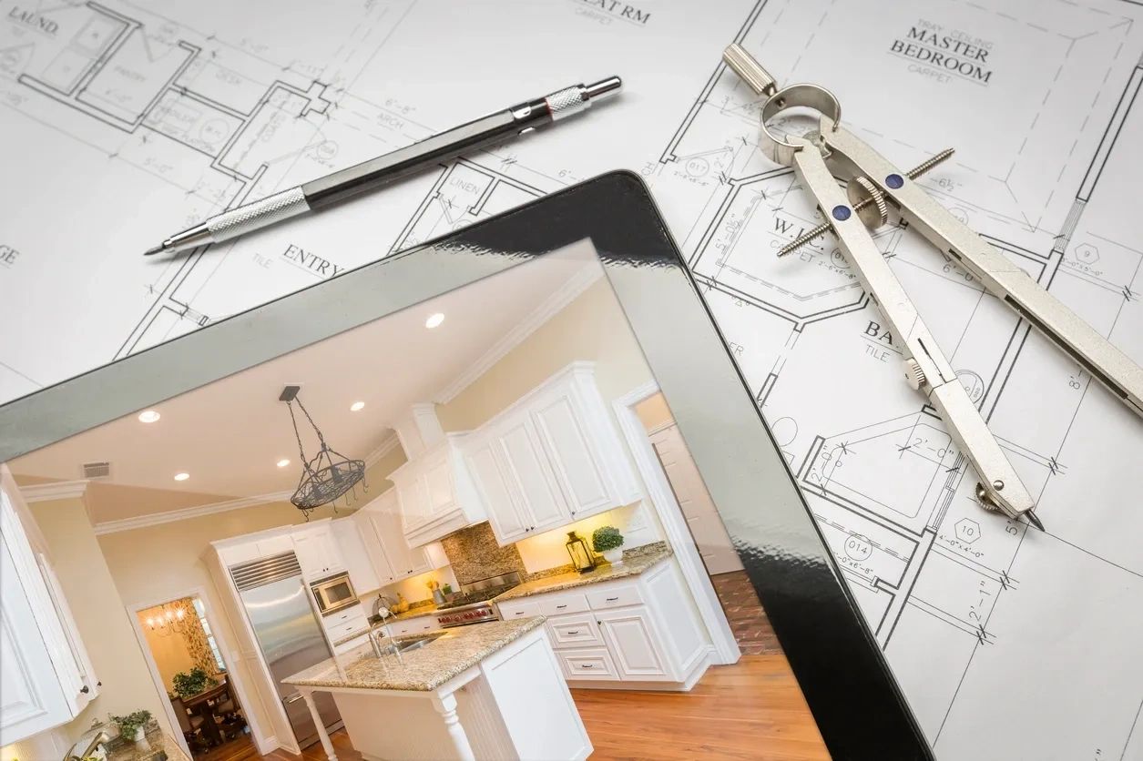Tablet showing kitchen design on architectural blueprints with drawing tools.