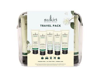 Sukin travel pack with natural skincare essentials in a clear pouch.