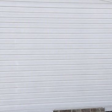 White horizontal siding on a building exterior.
