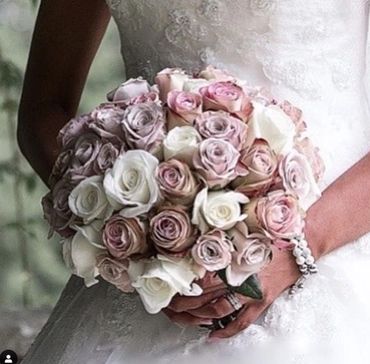 All rose wedding bouquet, white, blush and dusky pink roses.