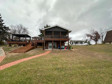 Multi level deck with shaker siding and concrete. Long Lake. Reading, MI 