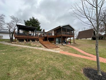 Multi level deck with shaker siding and concrete. Long Lake. Reading, MI 