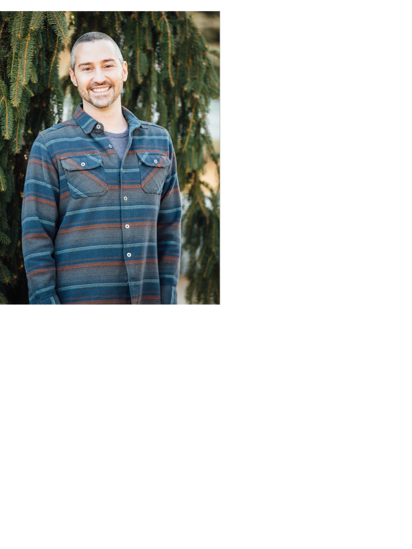 Doctor John Venditti in a flannel shirt 